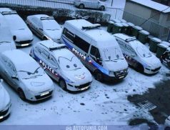 snow faces on police cars