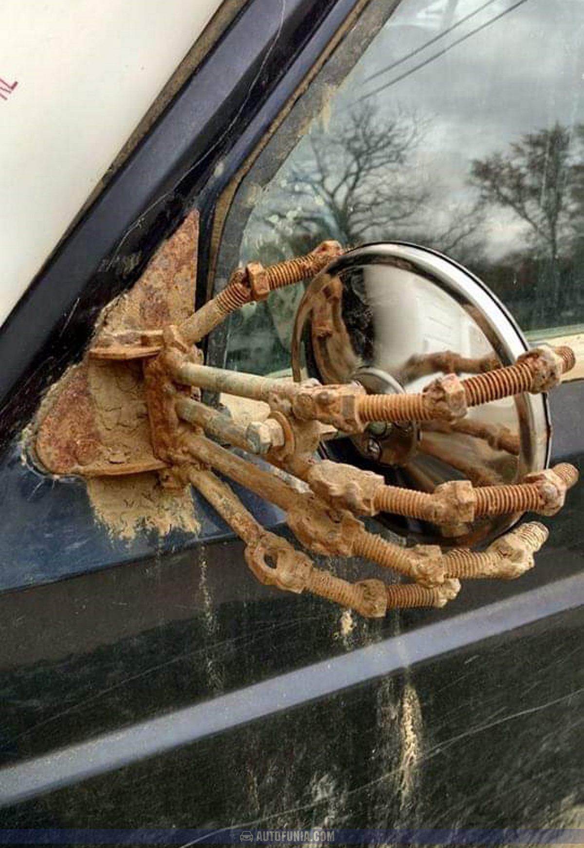 car mirror holder hand